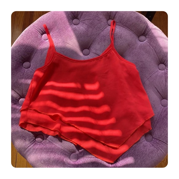 β
Teenbell Neon Asymmetric Flowy Top β
- Picture 12 of 13